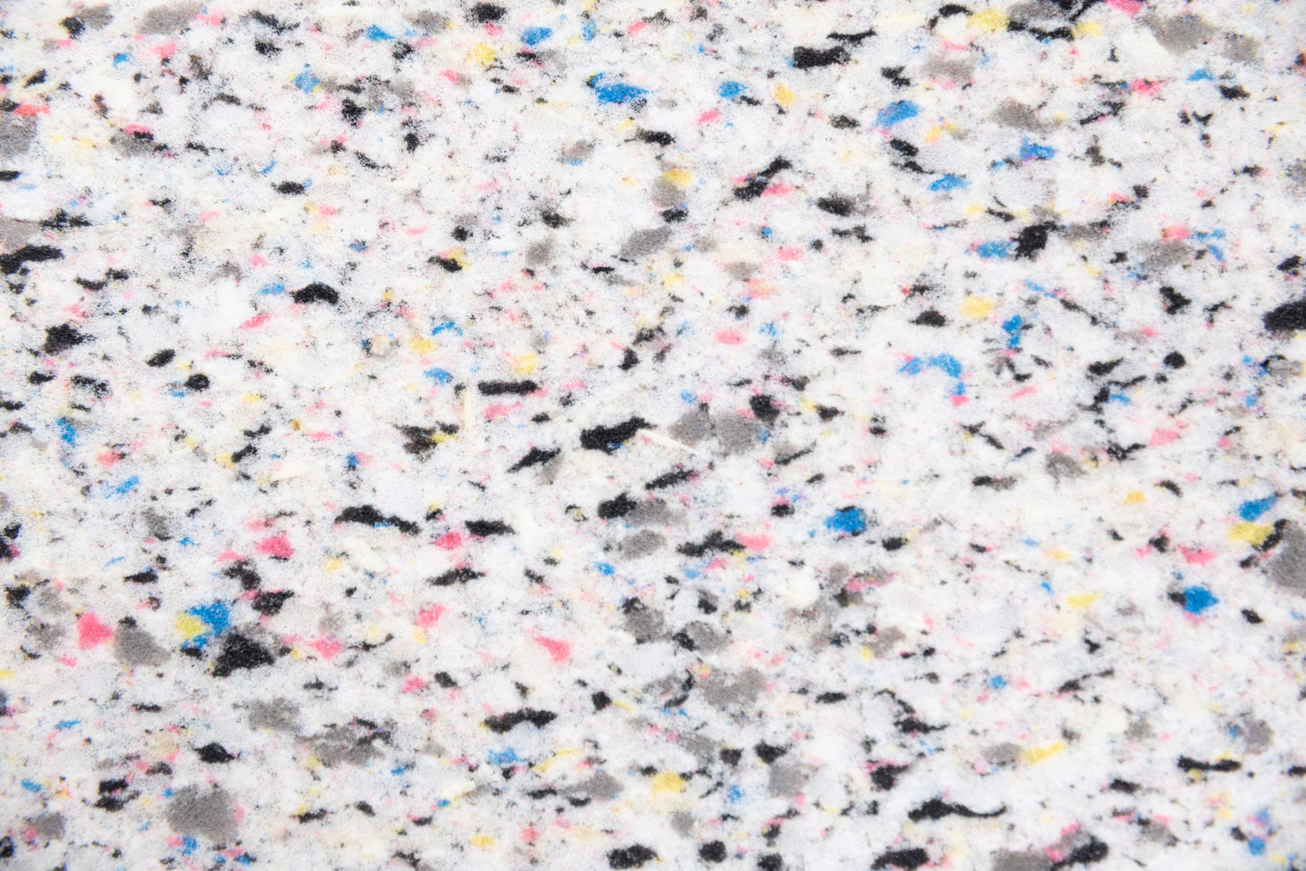 Gray foam macro with recycled color patches.