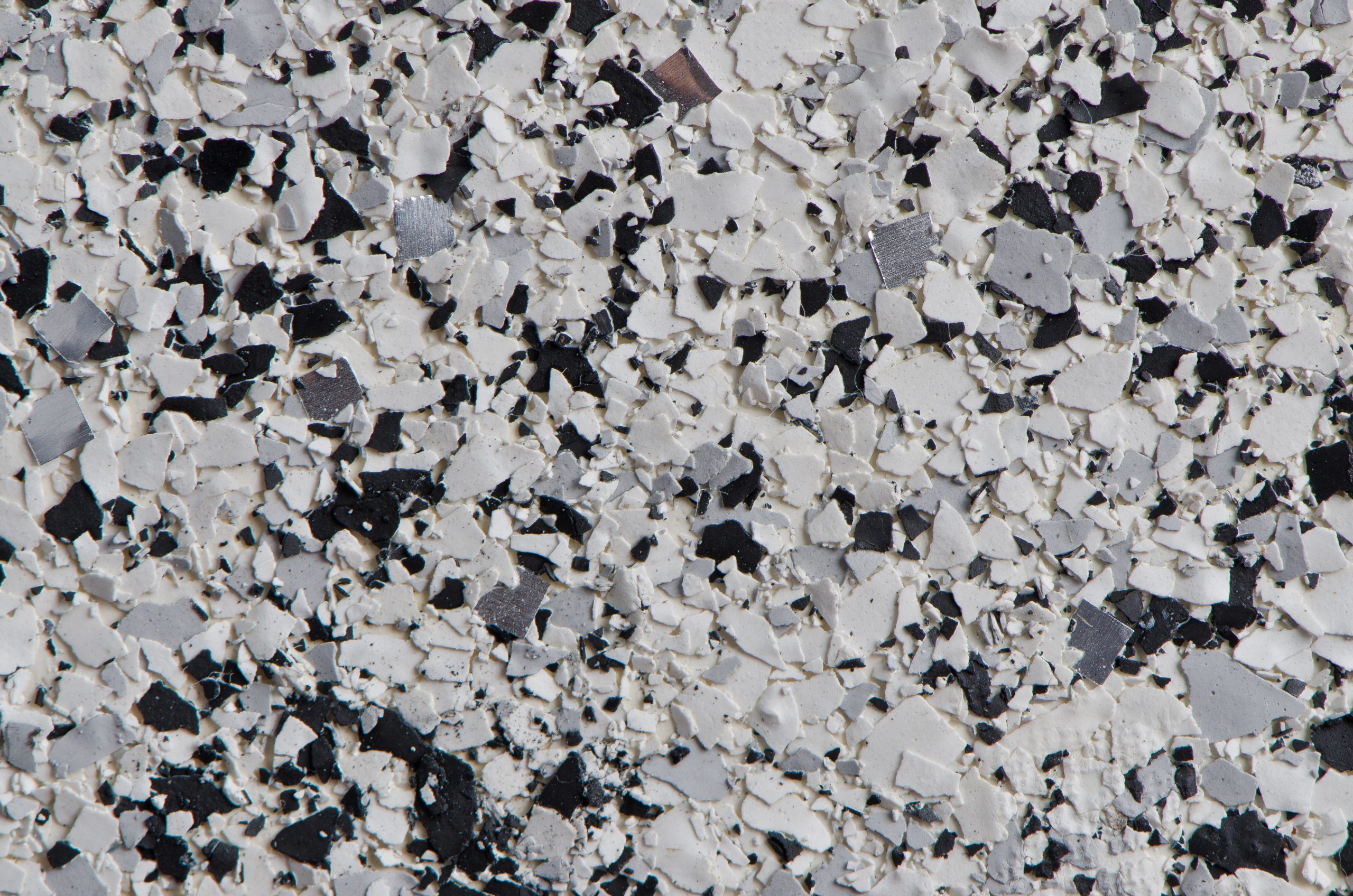 Artificial granite-like plastic texture.